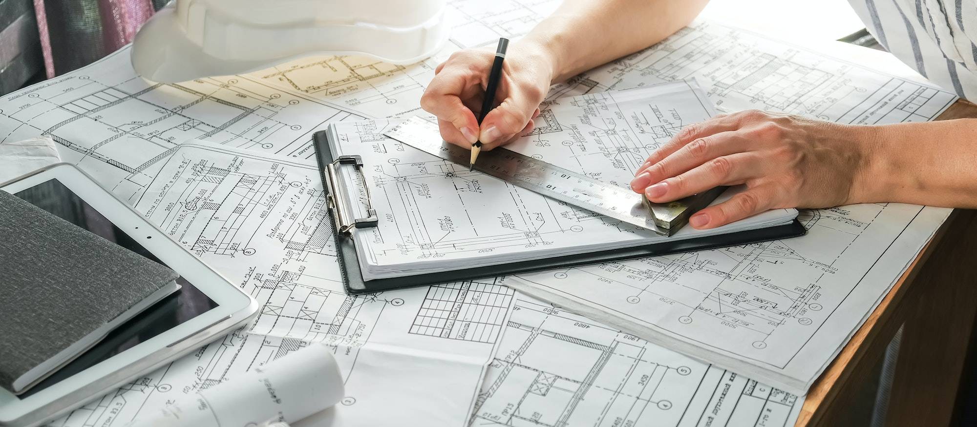 architect design working drawing sketch plans blueprints and making architectural